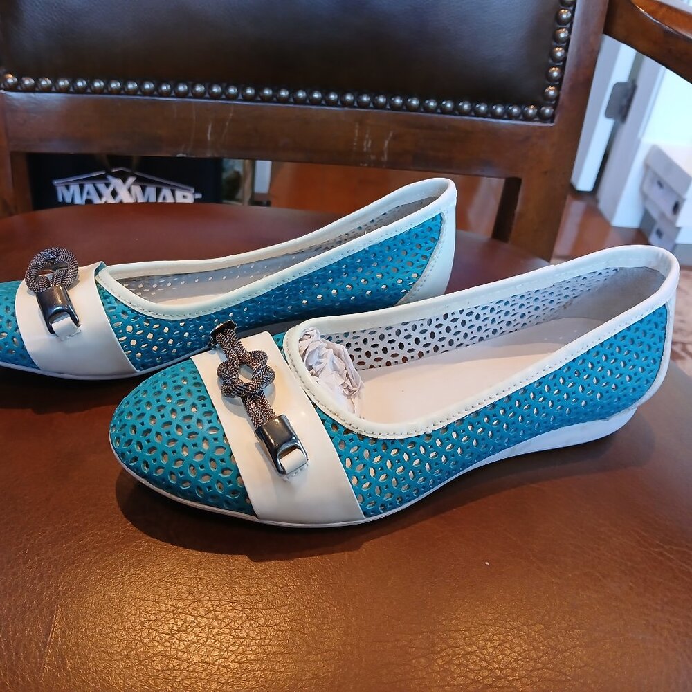 All leather women's flats . European made.